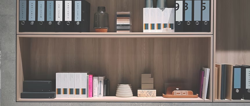 brown wooden shelf on grey wall